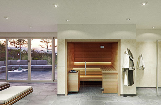 Sauna Bausatz für Zuhause: moderne Innensauna mit Glasfront in heller Espe. Indirekter LED Beleuchtung.